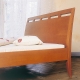 Piano III Bed with decorative solid headboard